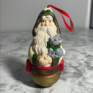 Vintage Santa Claus holding a Bunny Ornament with Red Velvet Ribbon